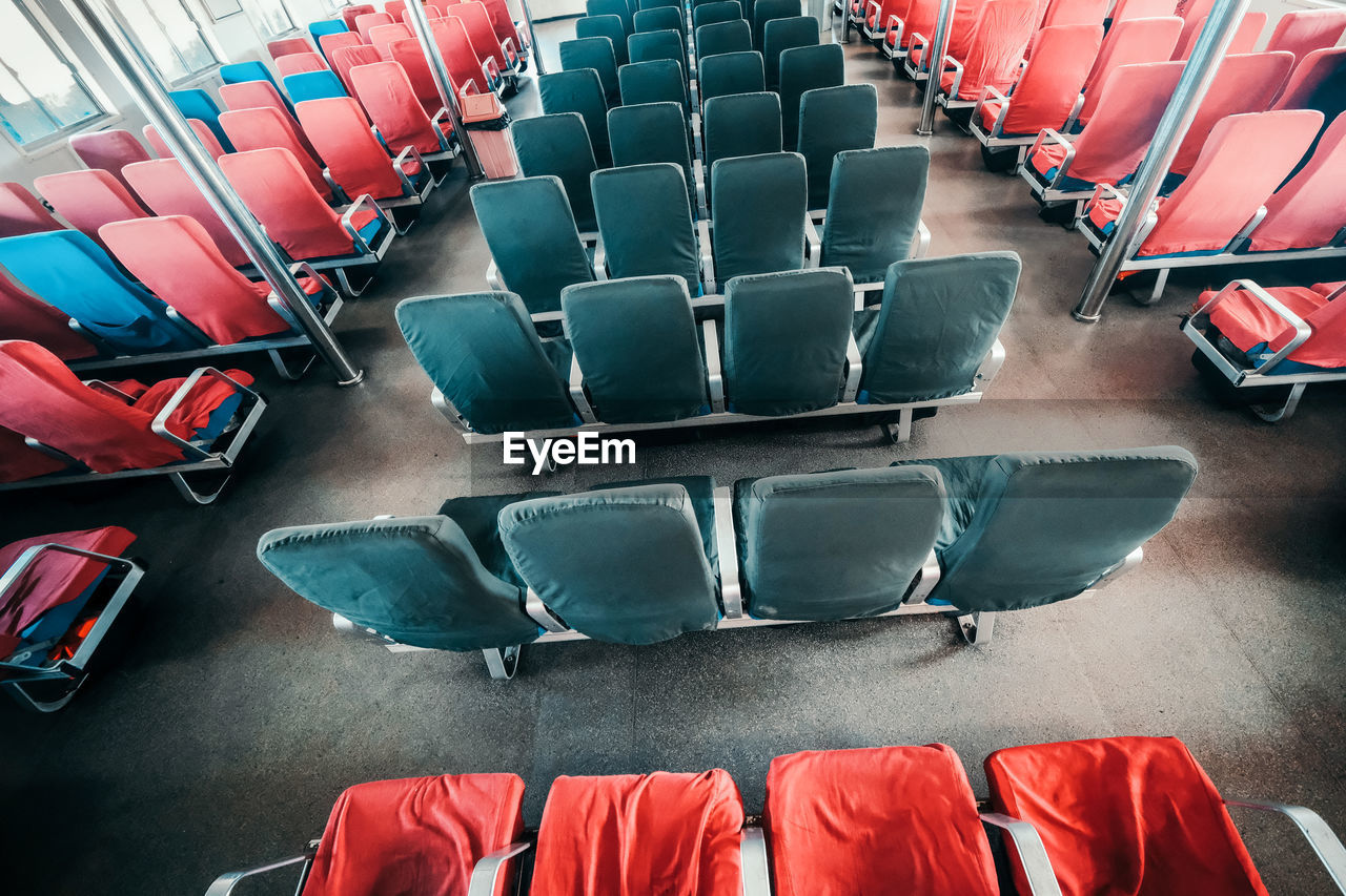 High angle view of empty chairs in vehicle