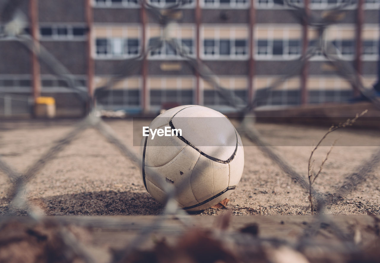 Soccer ball in empty playground