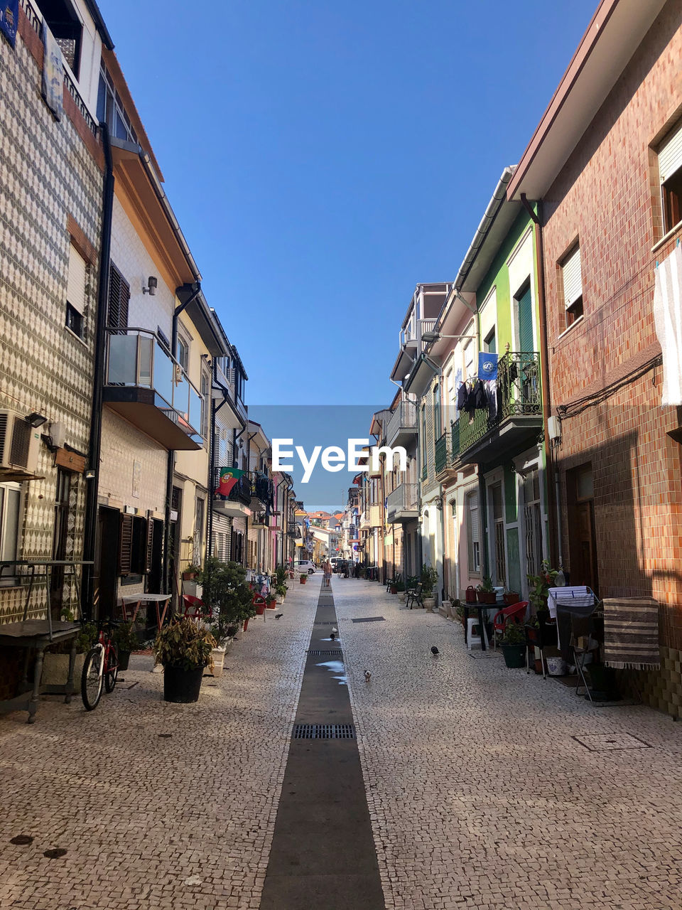 NARROW ALLEY ALONG BUILDINGS