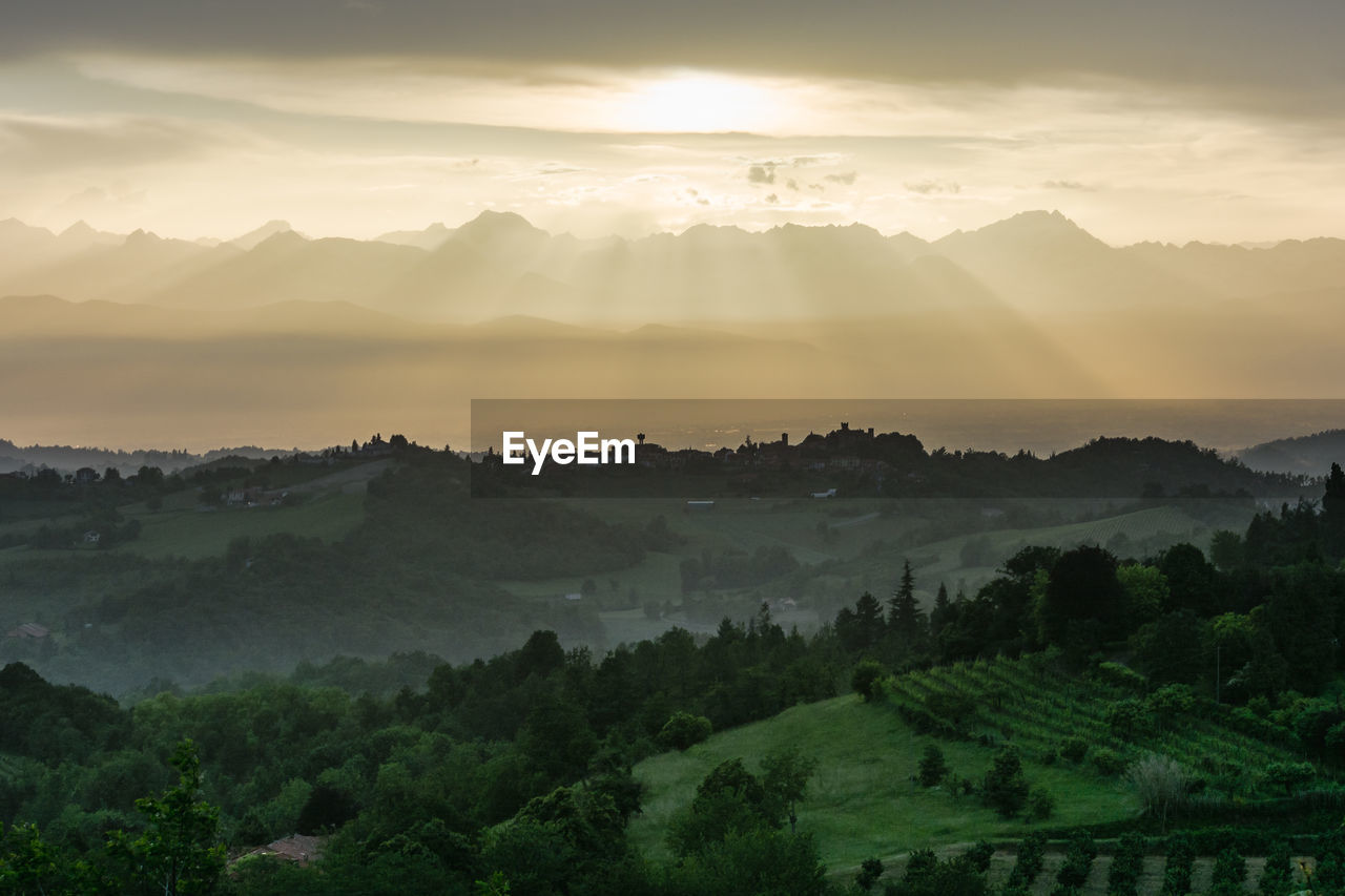 Panoramic view of landscape against sky during sunset