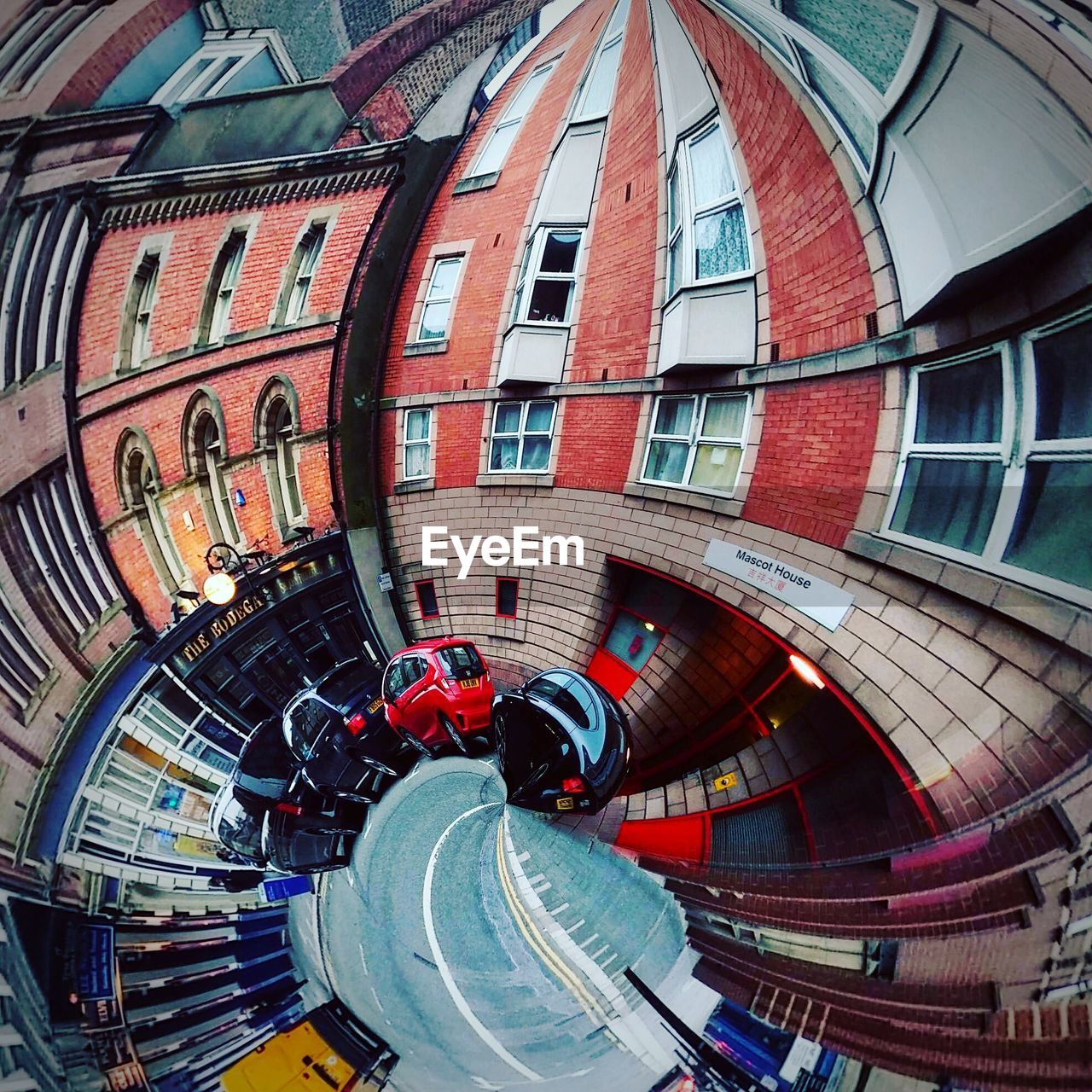 Fish-eye view of cars and buildings