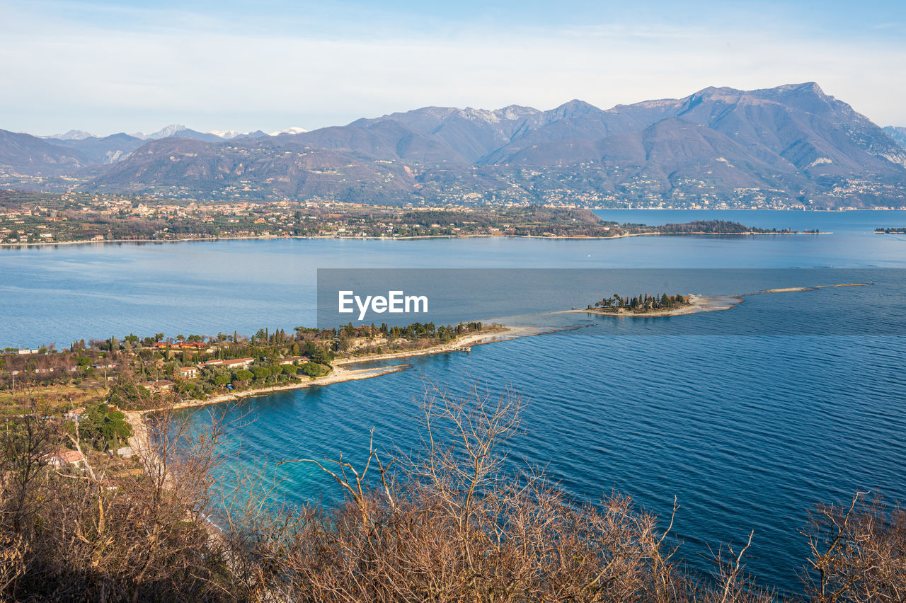 Aerial view of the lake garda with the rabbit island and the garda island from manerba