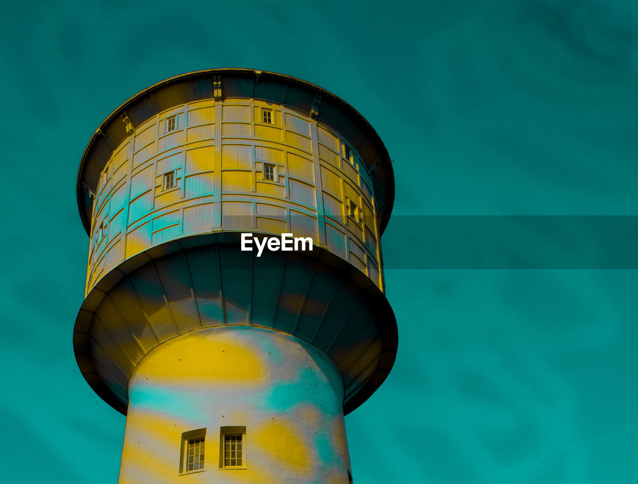 Low angle view of water tower against sky