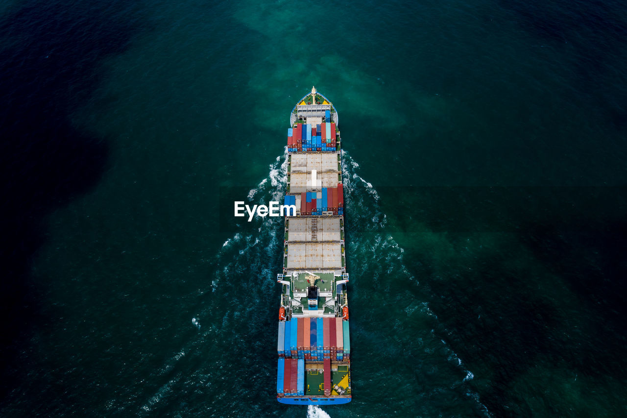 HIGH ANGLE VIEW OF SHIP ON SEA