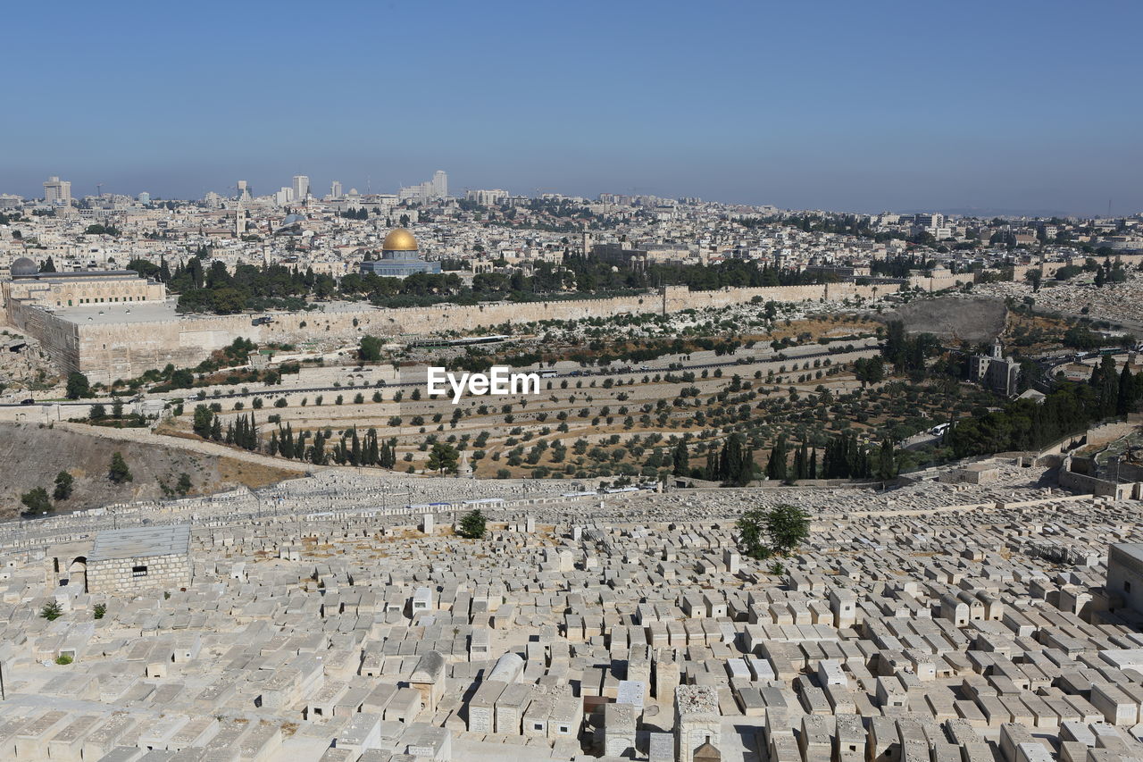 HIGH ANGLE VIEW OF TOWN IN CITY