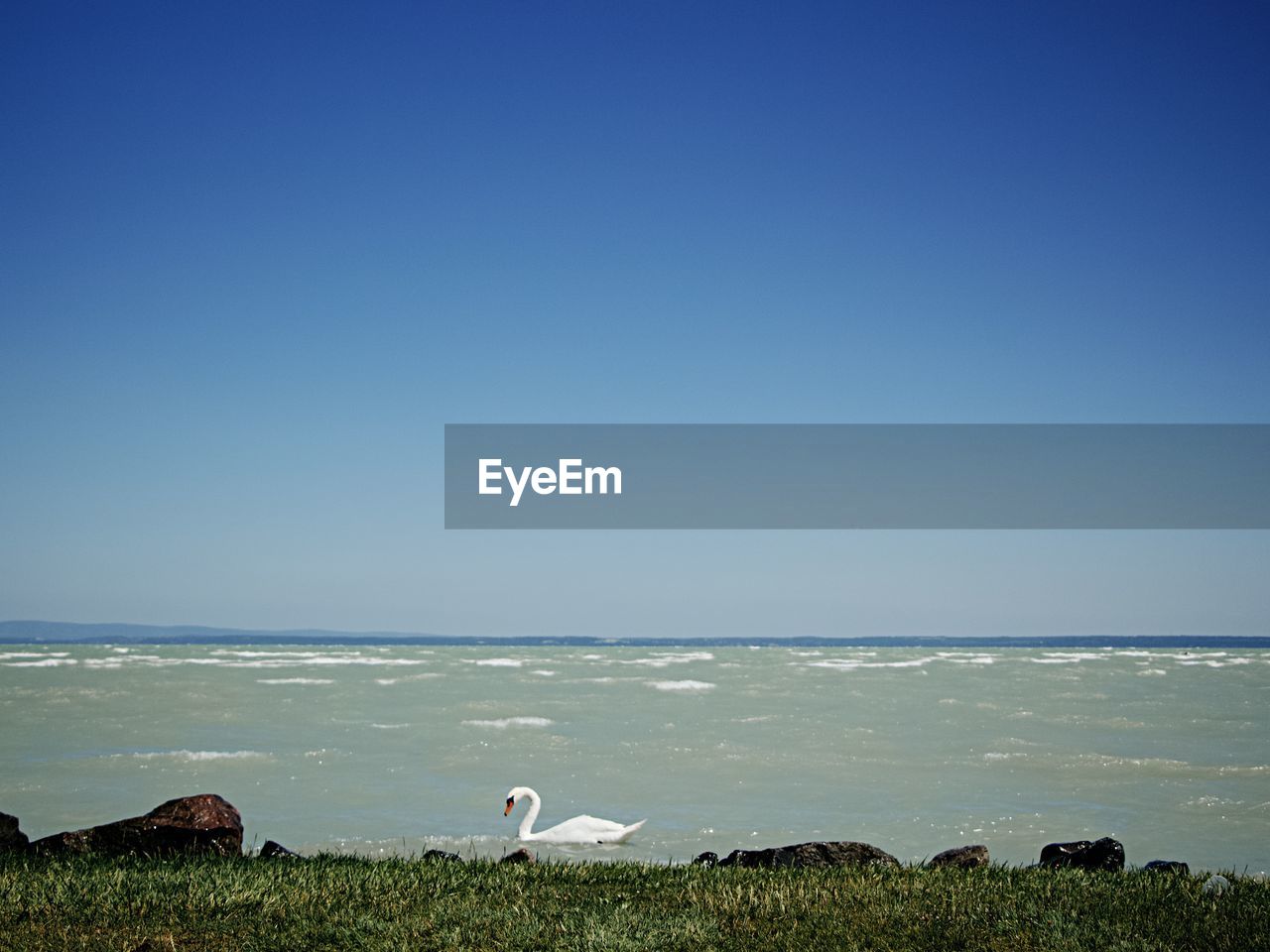 VIEW OF SEA AGAINST CLEAR BLUE SKY