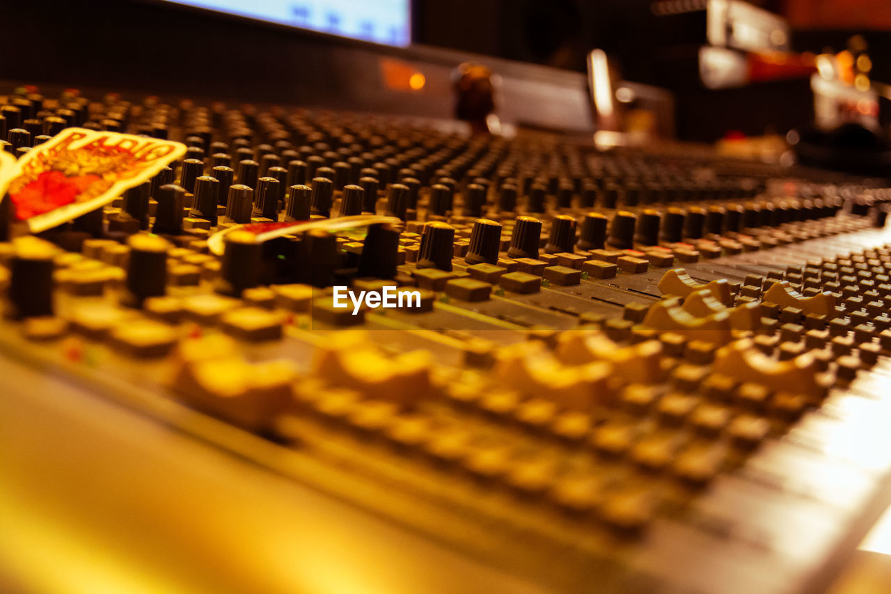 close-up of sound mixer in recording studio