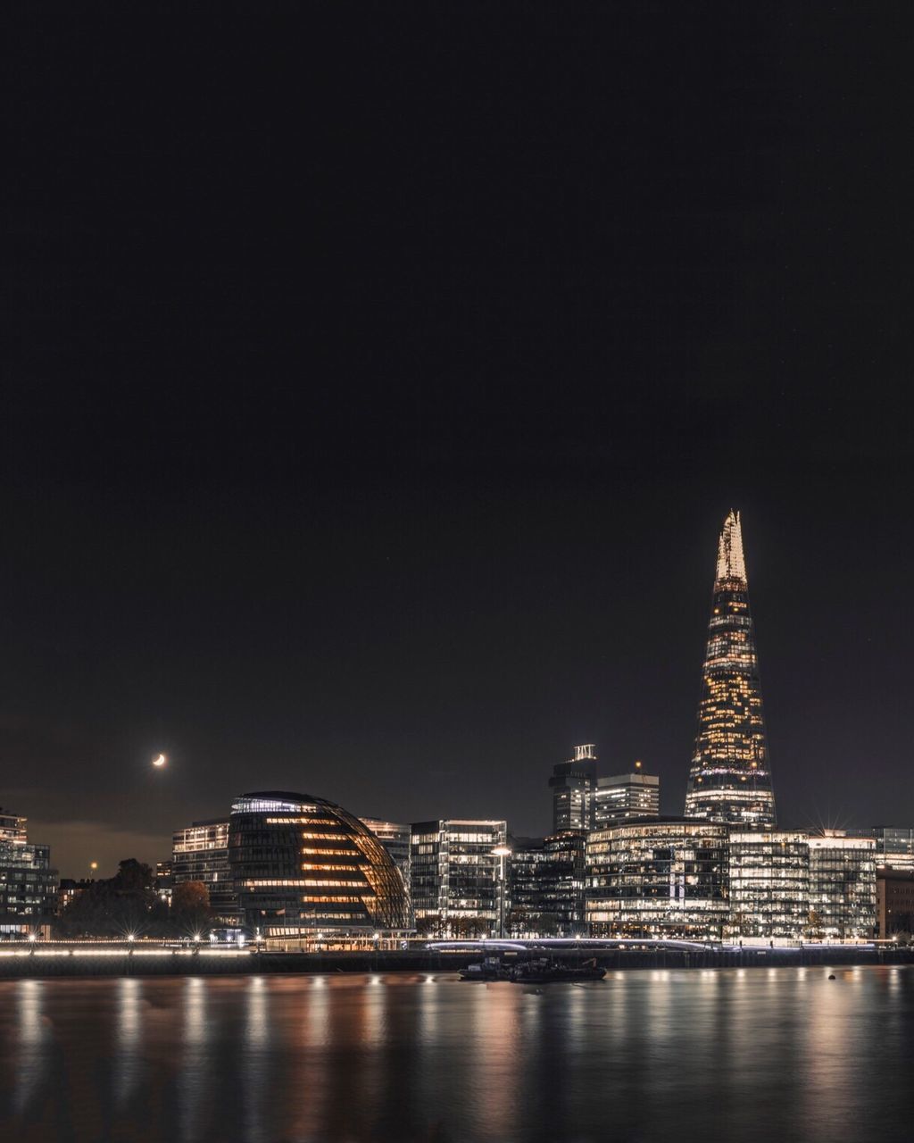 Illuminated city lit up at night