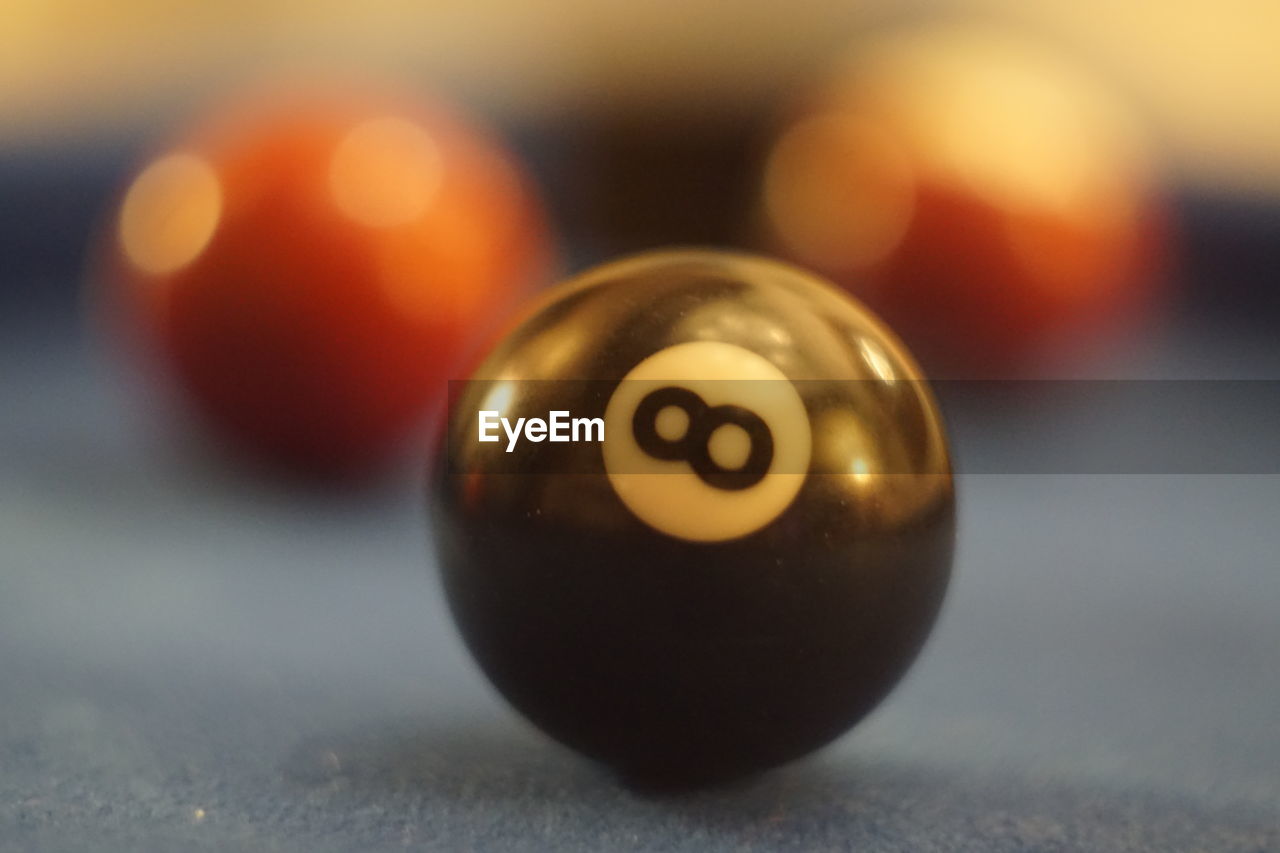 CLOSE-UP OF BALL ON TABLE AT HOME