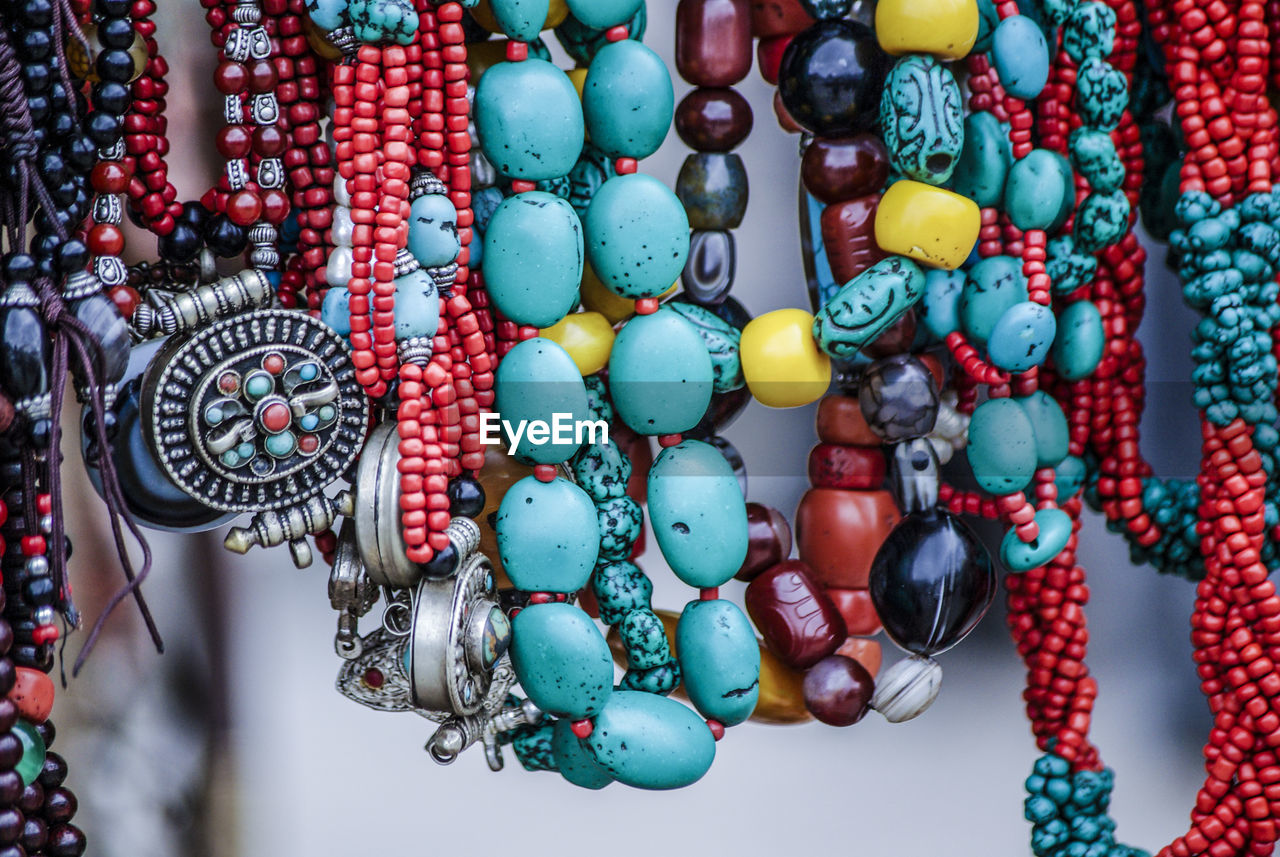 Close -up view of tibetan ornaments and necklaces