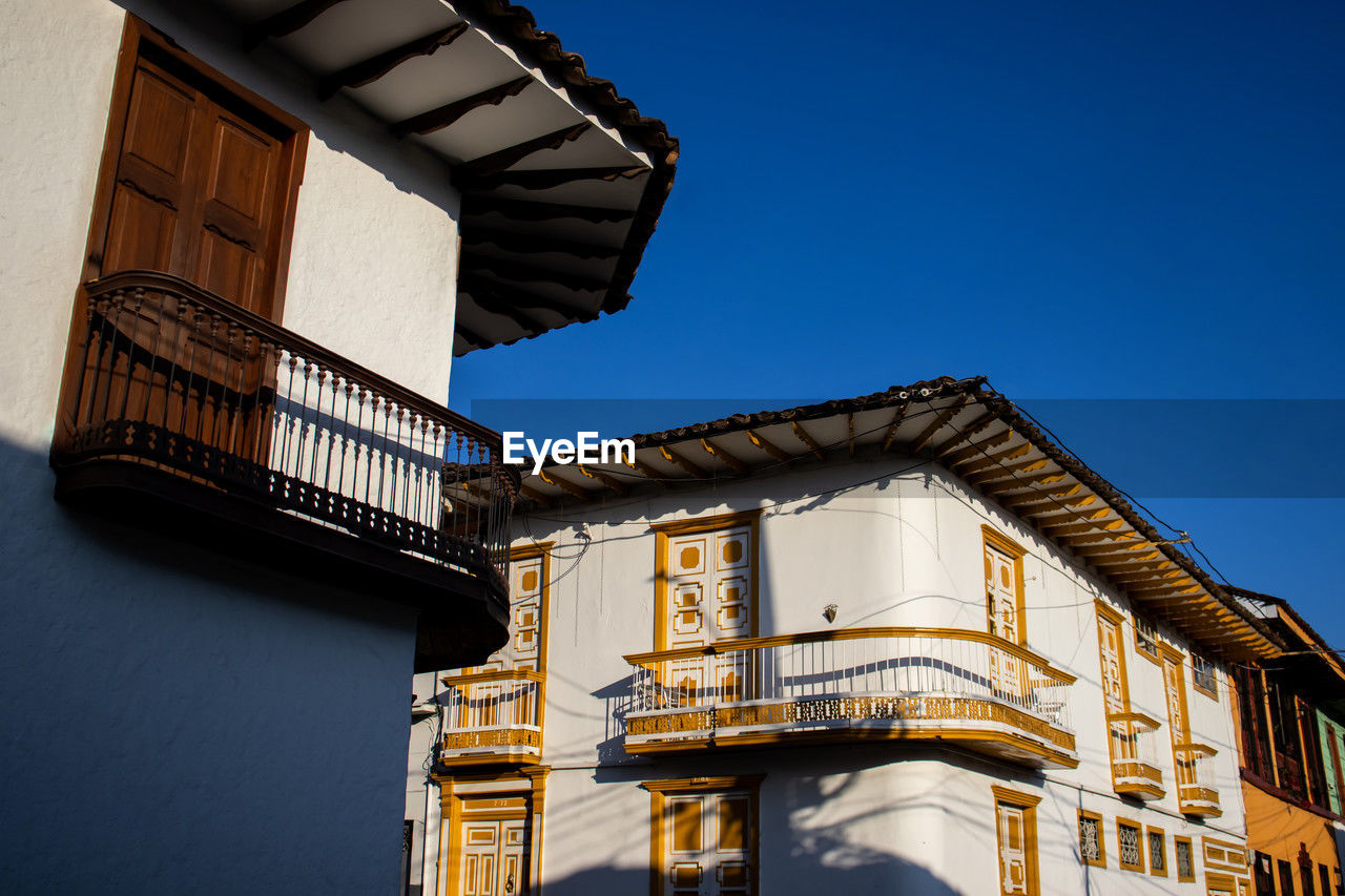 low angle view of building against blue sky