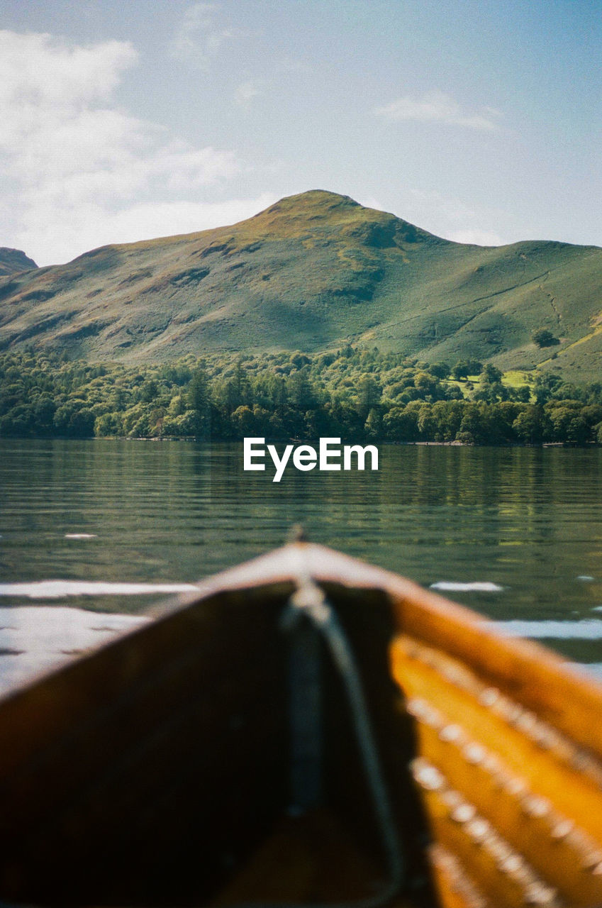 scenic view of lake against mountains