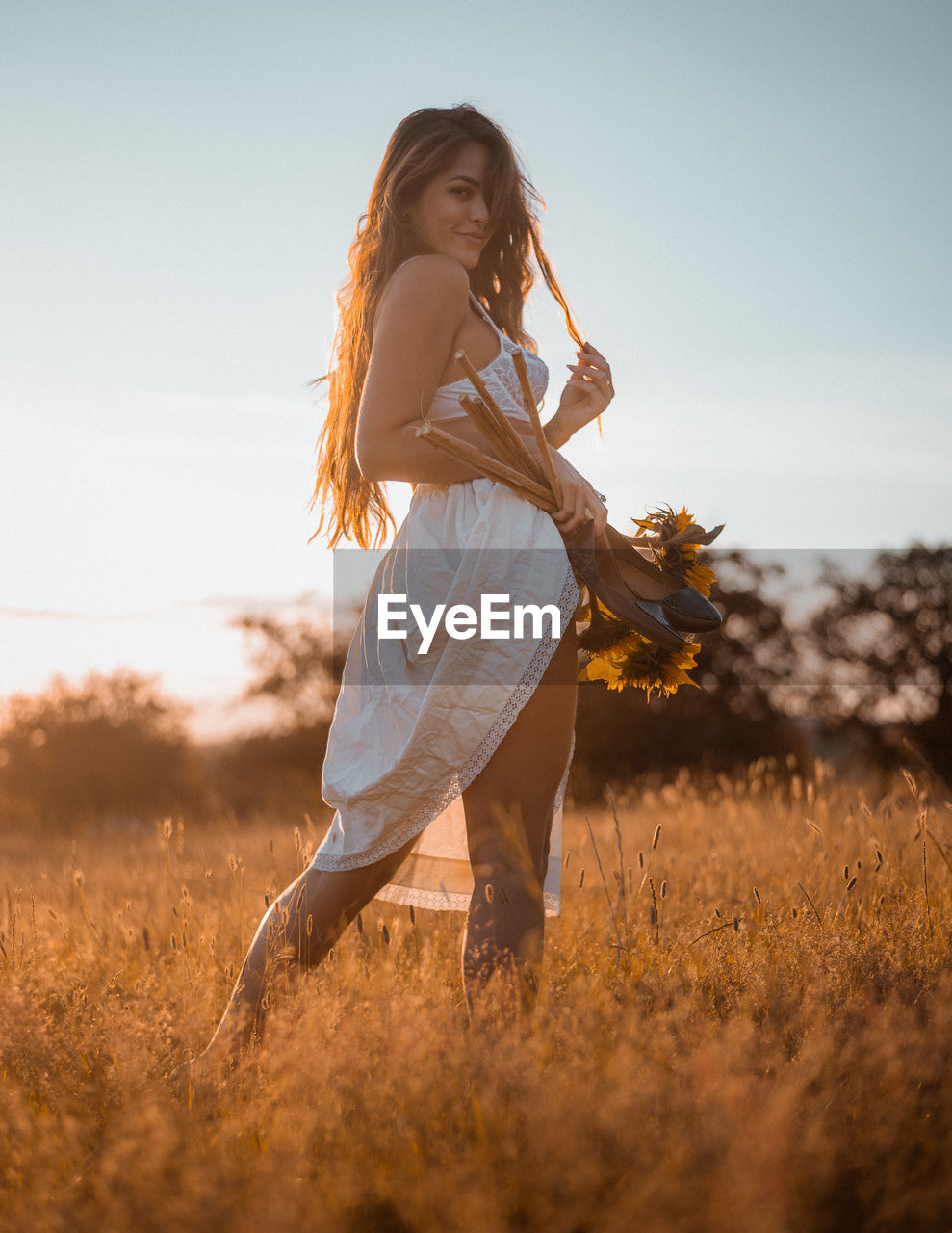 WOMAN IN A FIELD