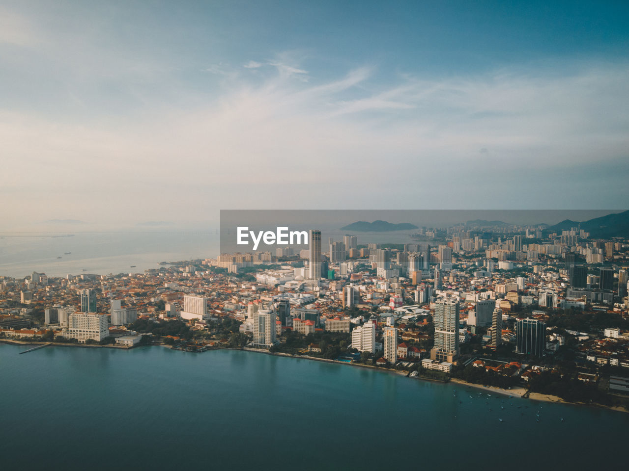 Komtar over george town city aerial drone view at penang, malaysia