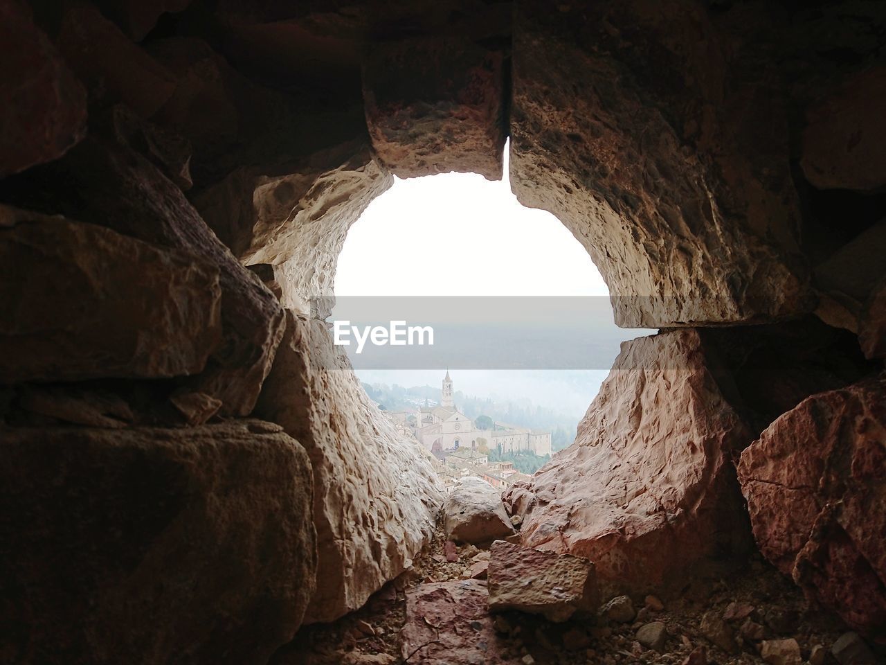 VIEW OF ROCK FORMATIONS THROUGH WINDOW