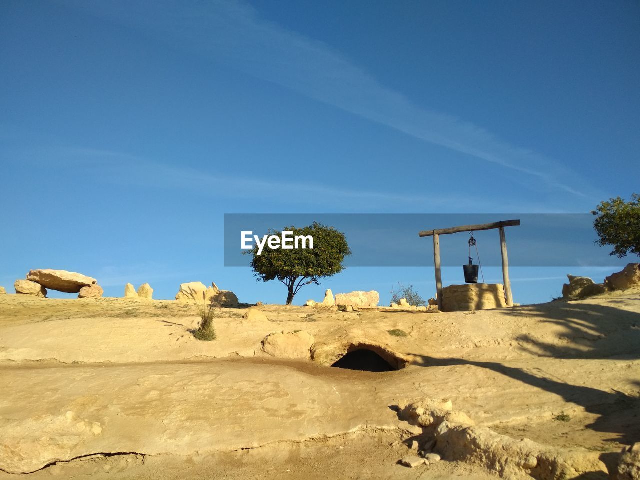 SCENIC VIEW OF DESERT LAND AGAINST SKY