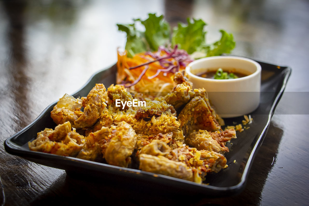 Close-up of food served on table