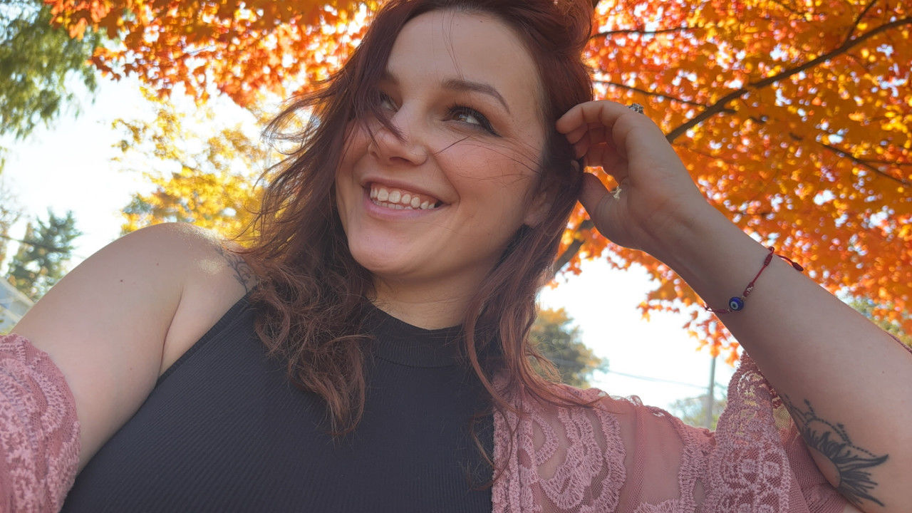 smiling, one person, adult, women, portrait, tree, autumn, young adult, happiness, nature, plant, looking at camera, leisure activity, emotion, hairstyle, long hair, sunlight, photo shoot, lifestyles, female, relaxation, day, clothing, outdoors, leaf, enjoyment, cheerful, smile, teeth, plant part, headshot, yellow, carefree, casual clothing, brown hair, beauty in nature, front view, waist up, back lit, spring, human hair, positive emotion, person, tranquility, low angle view, fashion