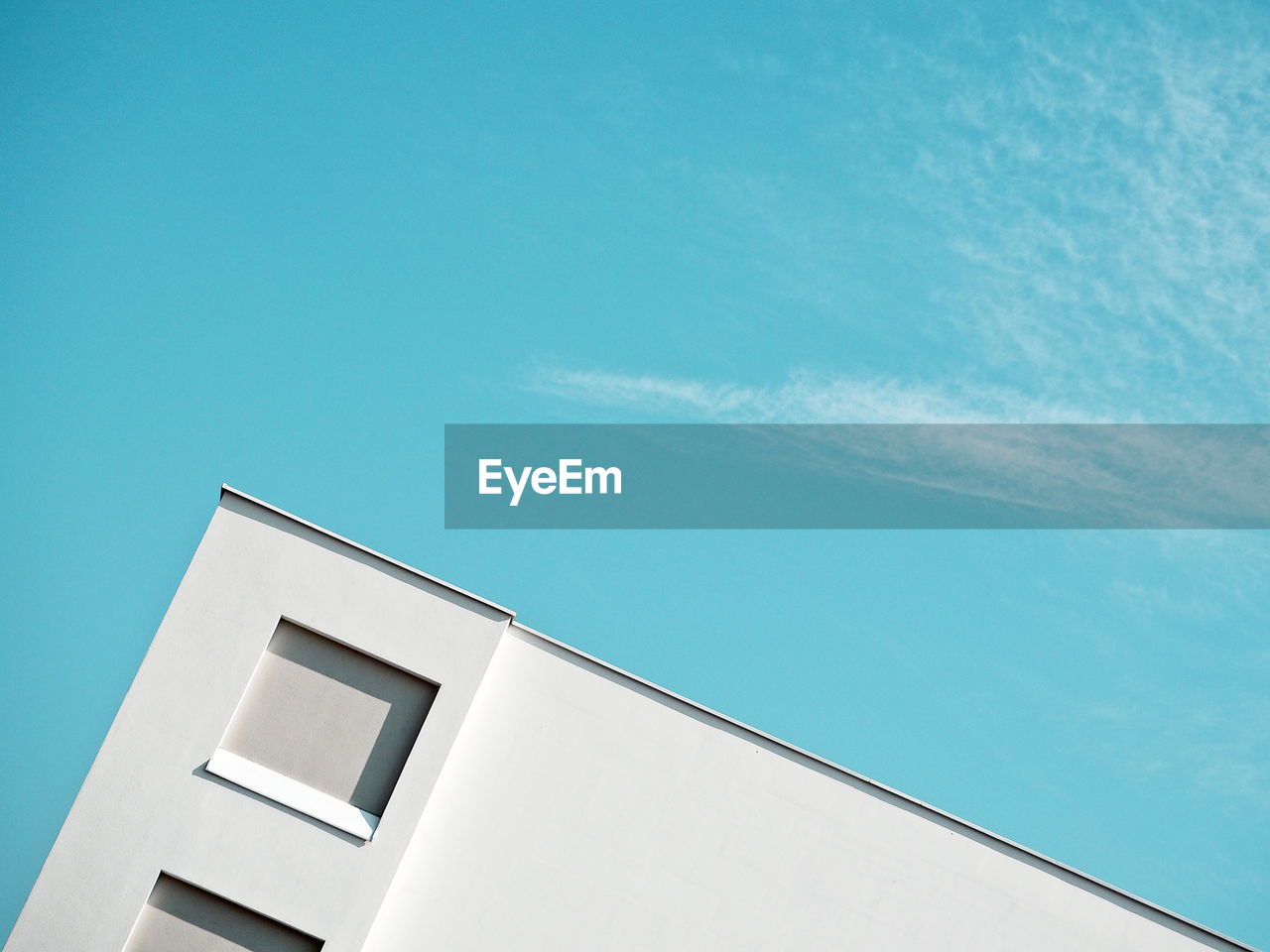 High angle view of building against blue sky