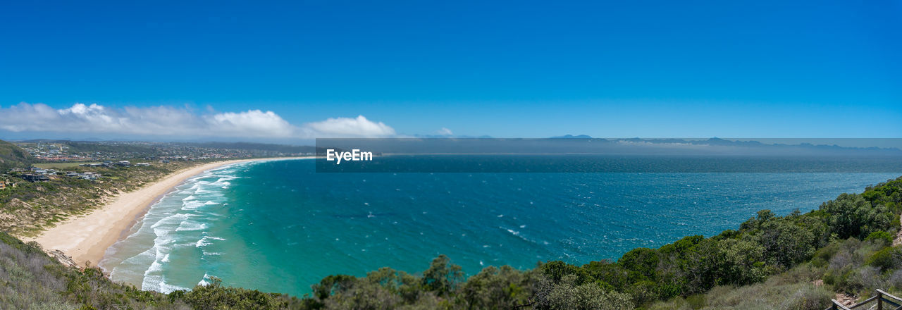 Epic panorama landscape with ocean beach and seaside town. plettenberg bay, south africa