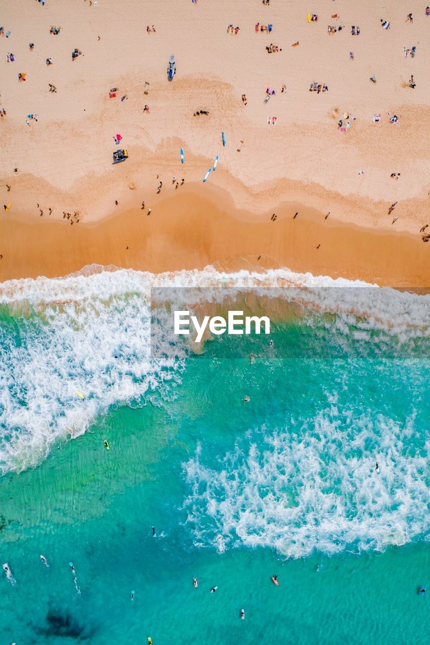 Drone view of people at beach