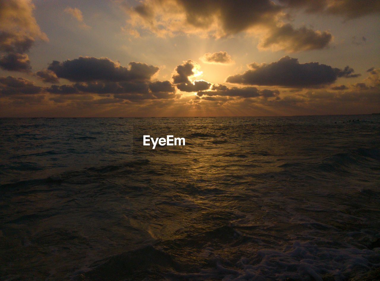 SCENIC VIEW OF SEA DURING SUNSET