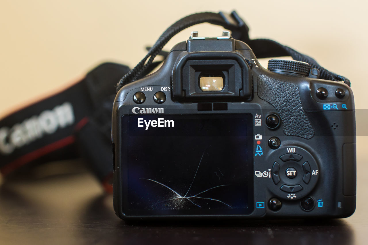 CLOSE-UP OF CAMERA ON MIRROR