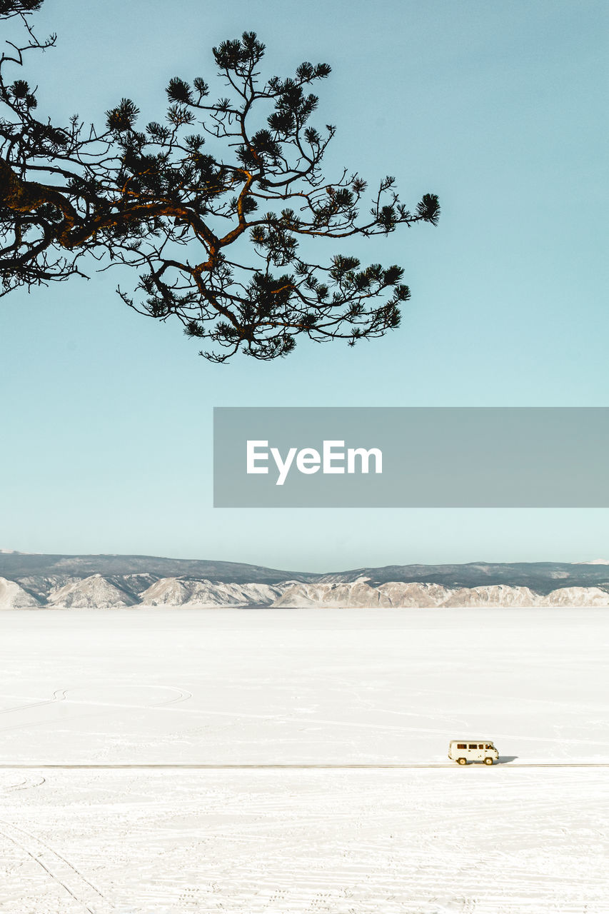 Scenic view of land against clear sky