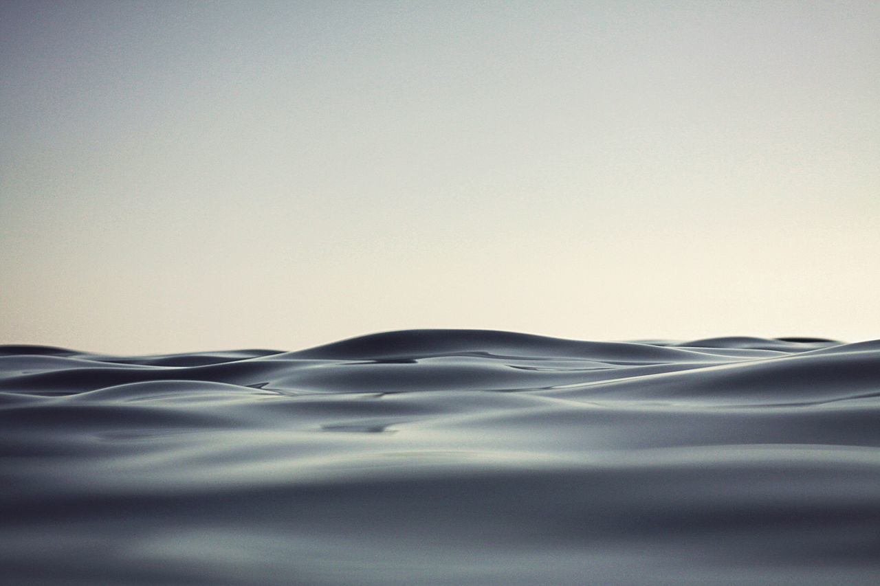 Close-up of rippled water in sea against sky at nerja