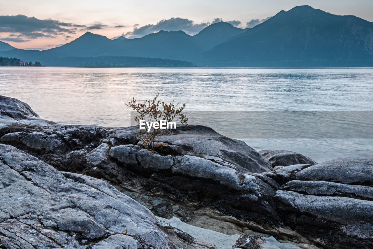 scenic view of sea and mountains