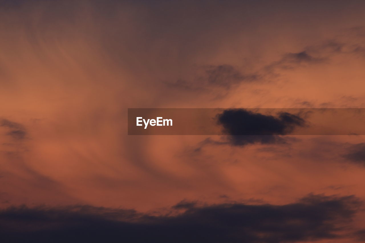 LOW ANGLE VIEW OF STORM CLOUDS IN SKY