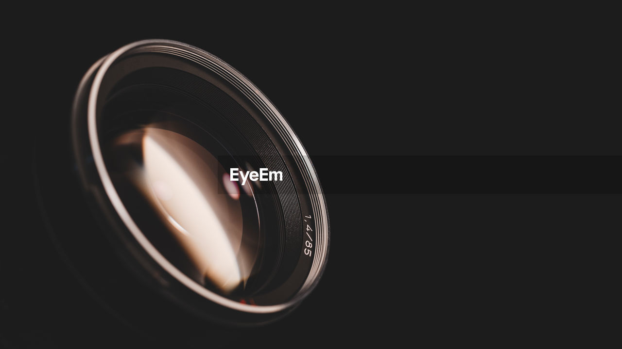 Close-up of lens in darkroom
