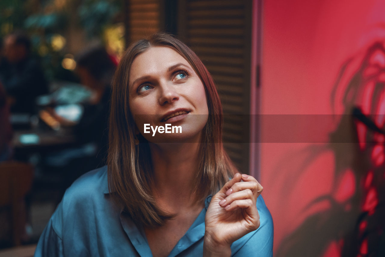 Woman portrait, in a cafe close up