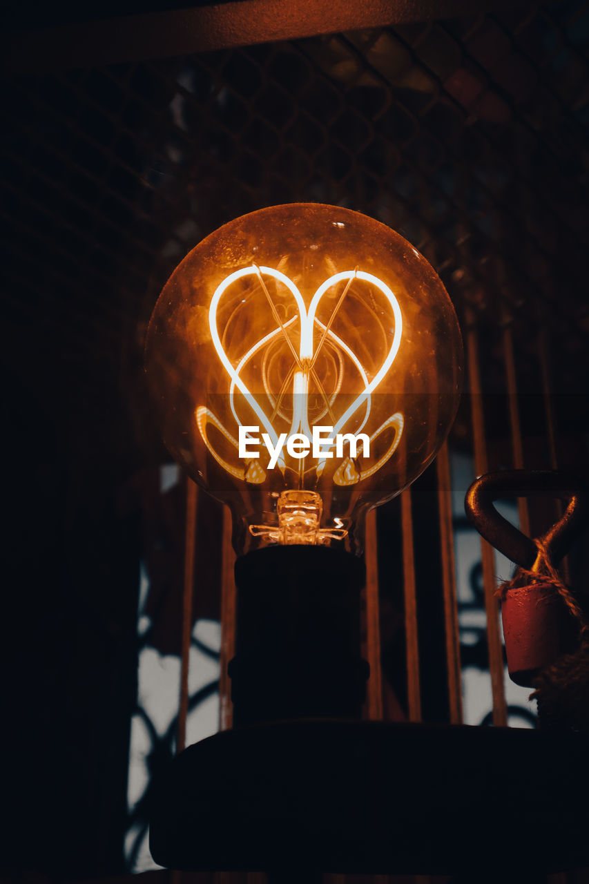 lighting equipment, light bulb, illuminated, light, darkness, glowing, electricity, indoors, filament, no people, lighting, light - natural phenomenon, electric light, electric lamp, night, burning, power generation, yellow, lamp