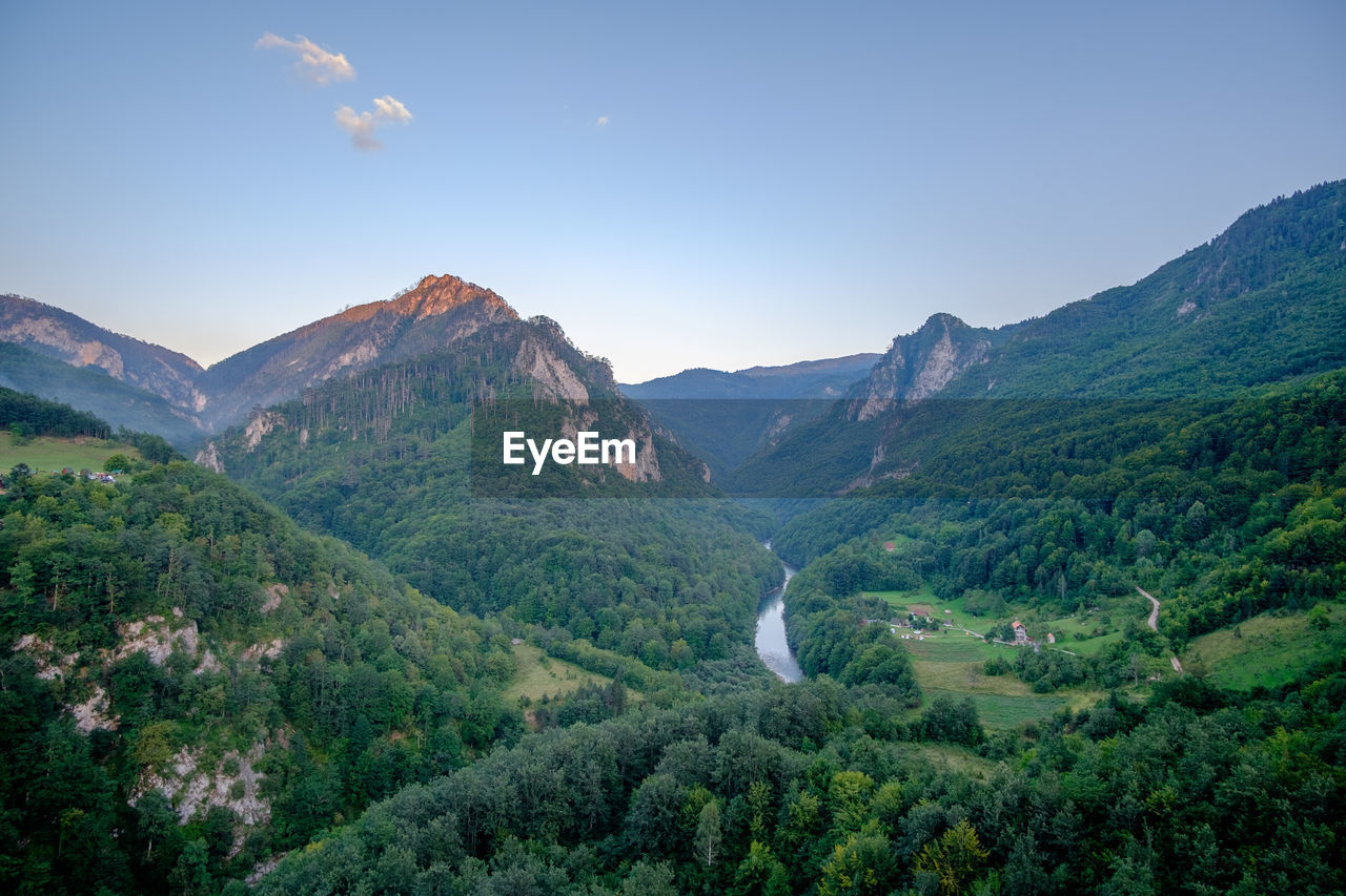 Scenic view of mountains against clear sky