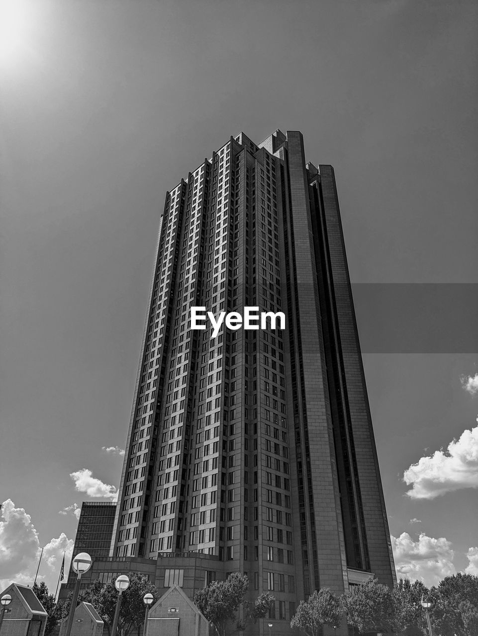 architecture, black and white, built structure, building exterior, sky, skyscraper, tower block, monochrome, landmark, city, building, monochrome photography, metropolis, office building exterior, low angle view, nature, cityscape, tower, skyline, no people, black, cloud, metropolitan area, urban area, outdoors, travel destinations, residential district, white, landscape, downtown, travel, office