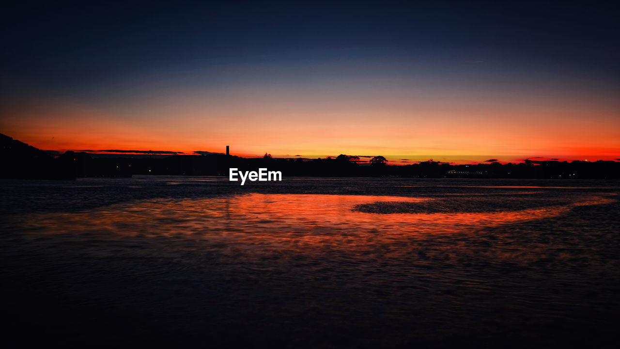 SCENIC VIEW OF SEA AGAINST ROMANTIC SKY