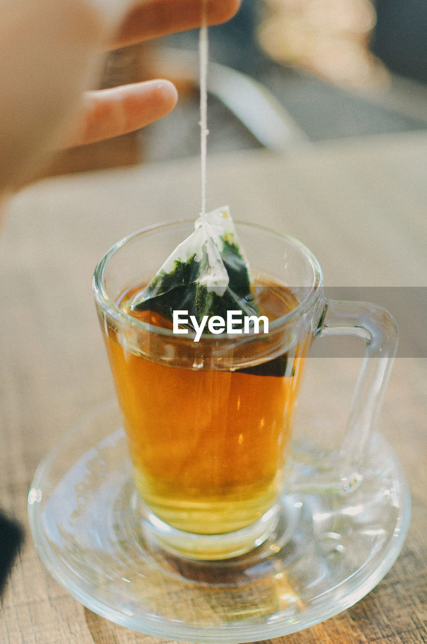 Close-up of tea in glass on table