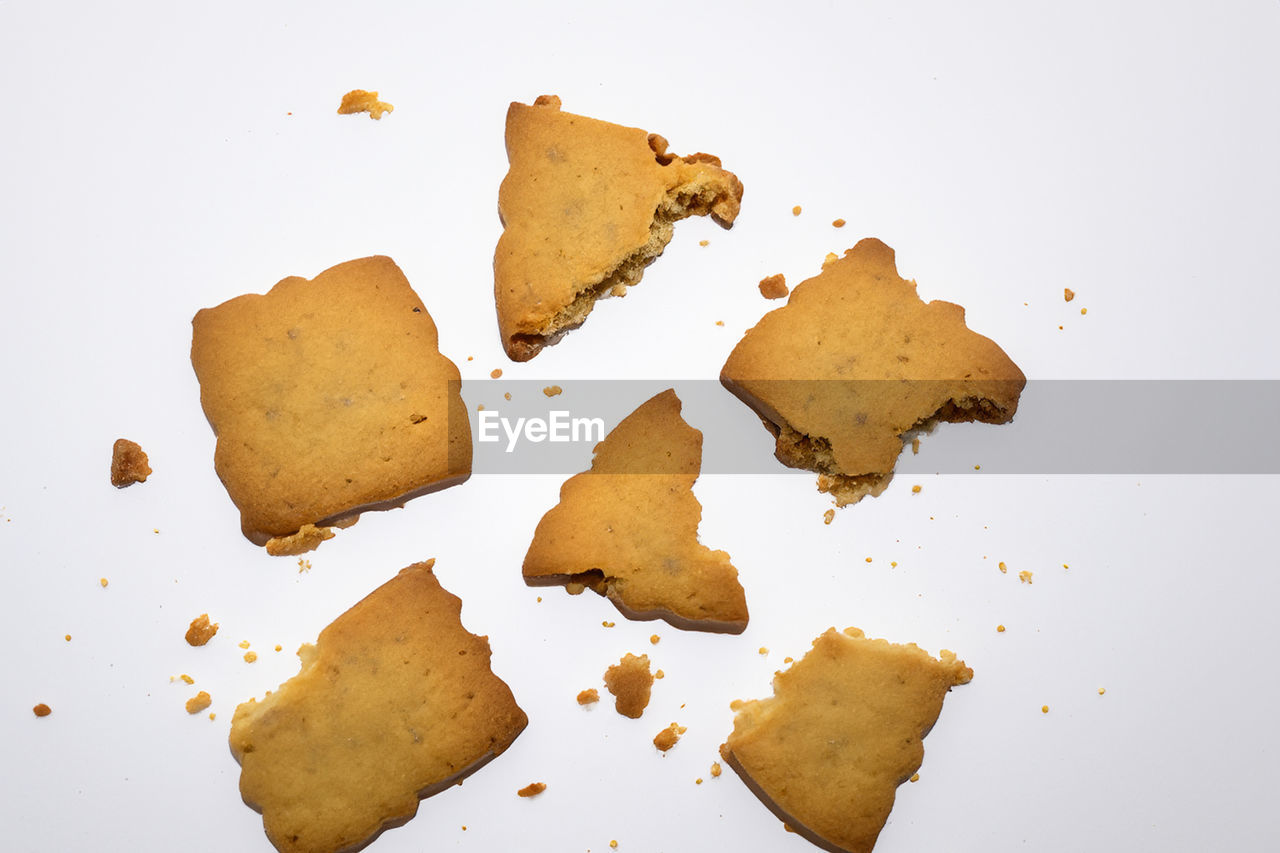 food, dessert, food and drink, snack, white background, no people, indoors, studio shot, cookies and crackers, brown, shape, cookie, baked