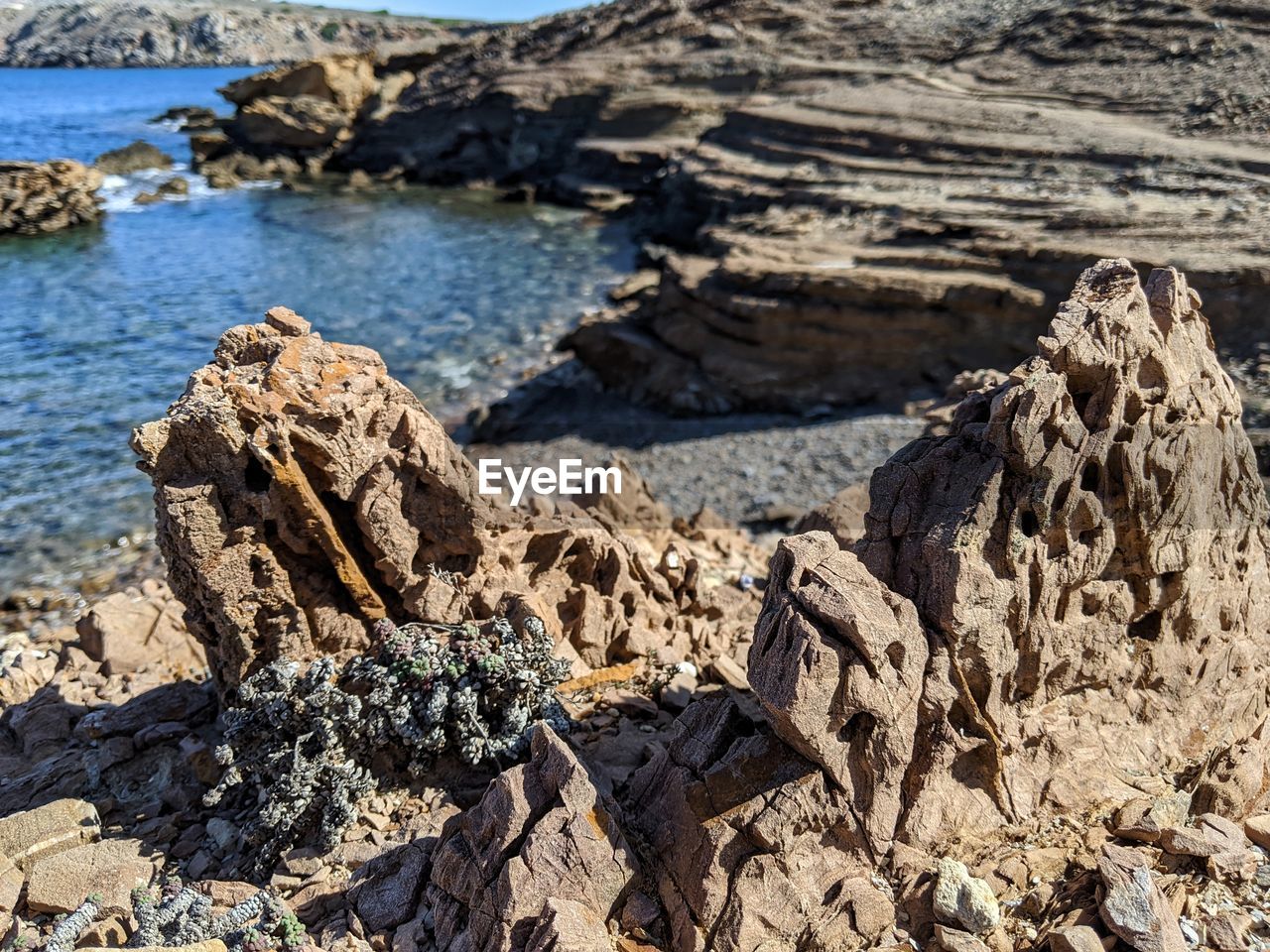 High angle view of rocks on shore