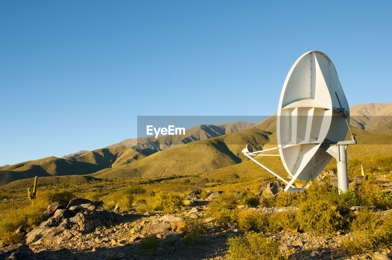 SCENIC VIEW OF MOUNTAIN AGAINST CLEAR BLUE SKY