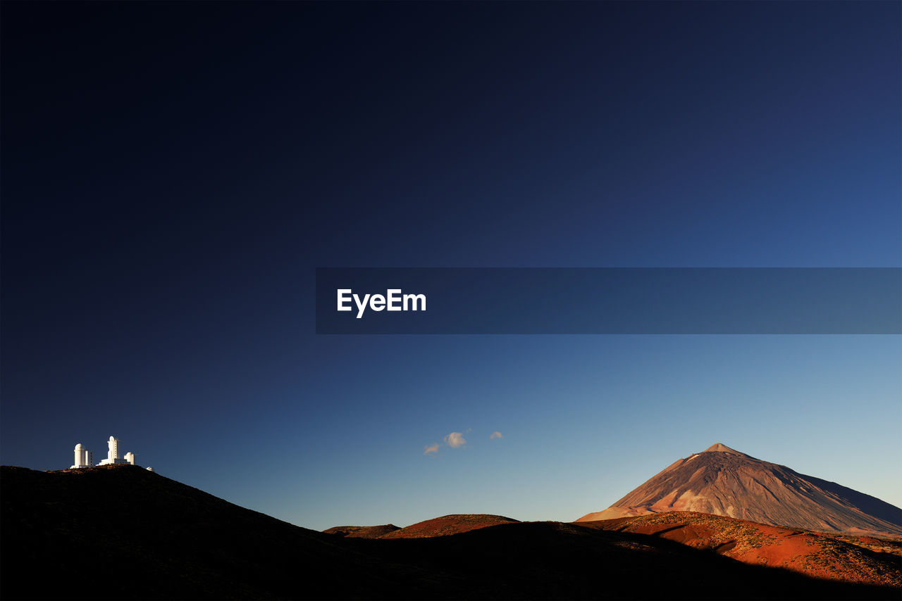 View of el teide national park against clear blue sky