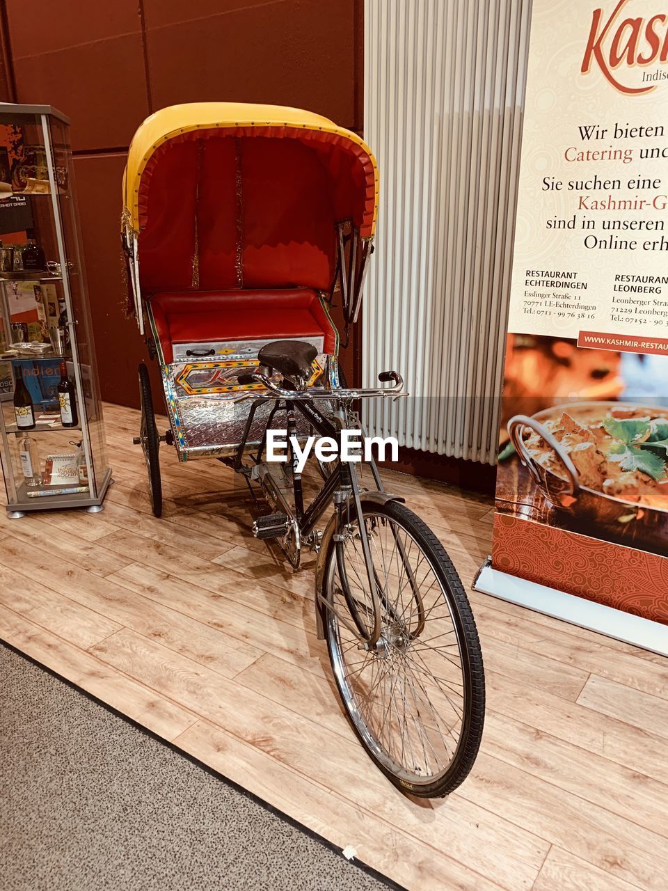 BICYCLES ON WOODEN CHAIR