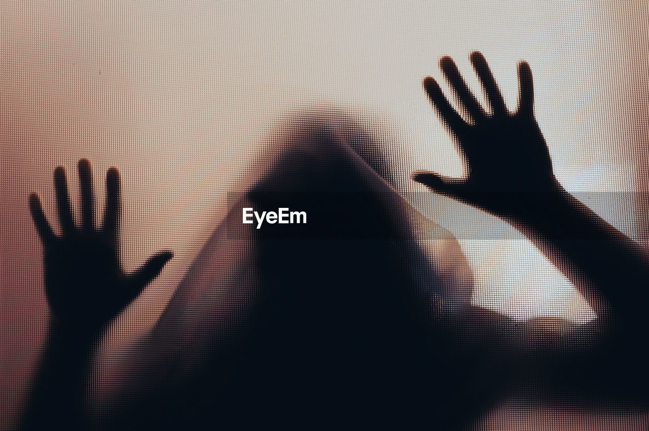 hand, black, shadow, finger, one person, silhouette, darkness, indoors, close-up, adult, light, white, fear, emotion, hand raised, spooky, palm, limb, women, human limb, arm, horror, dark, mystery, sadness, gesturing