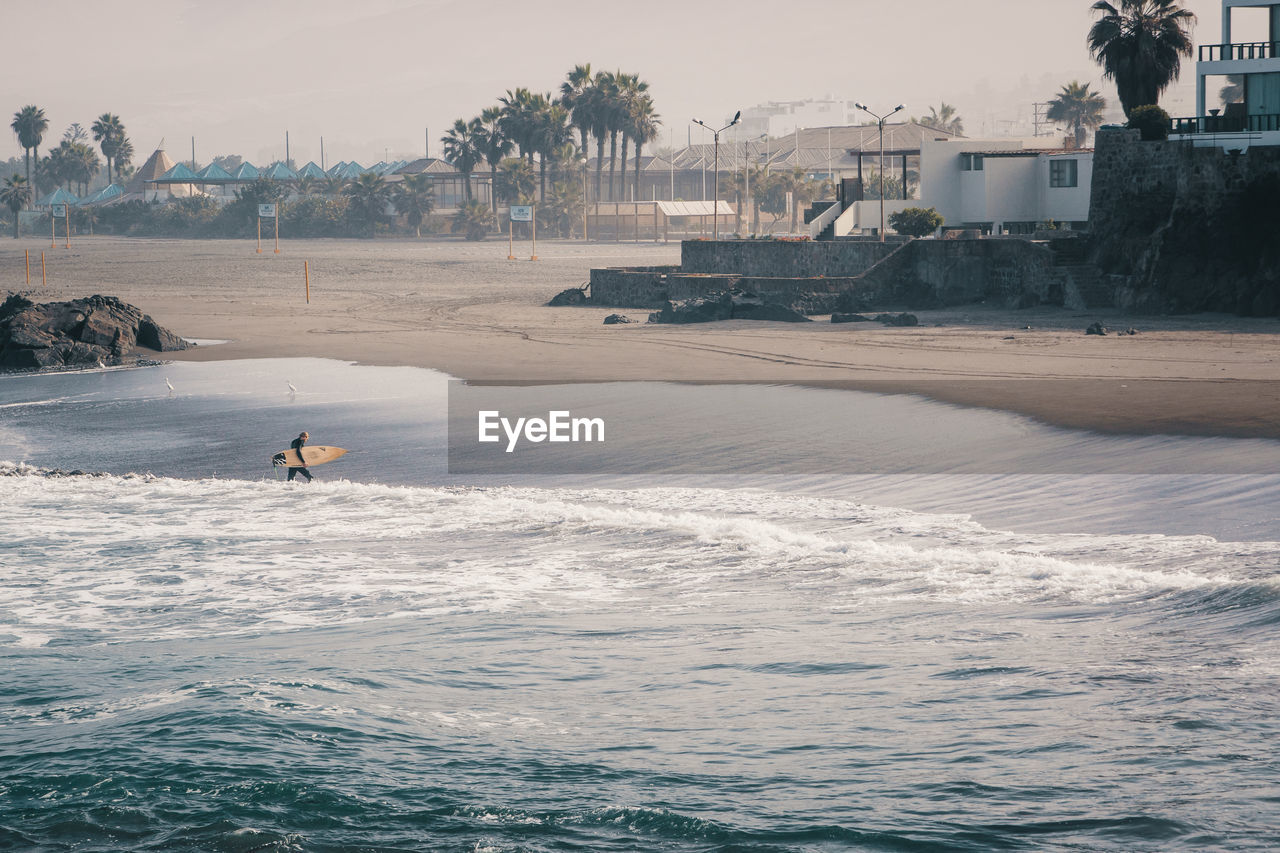 Man surfing in sea