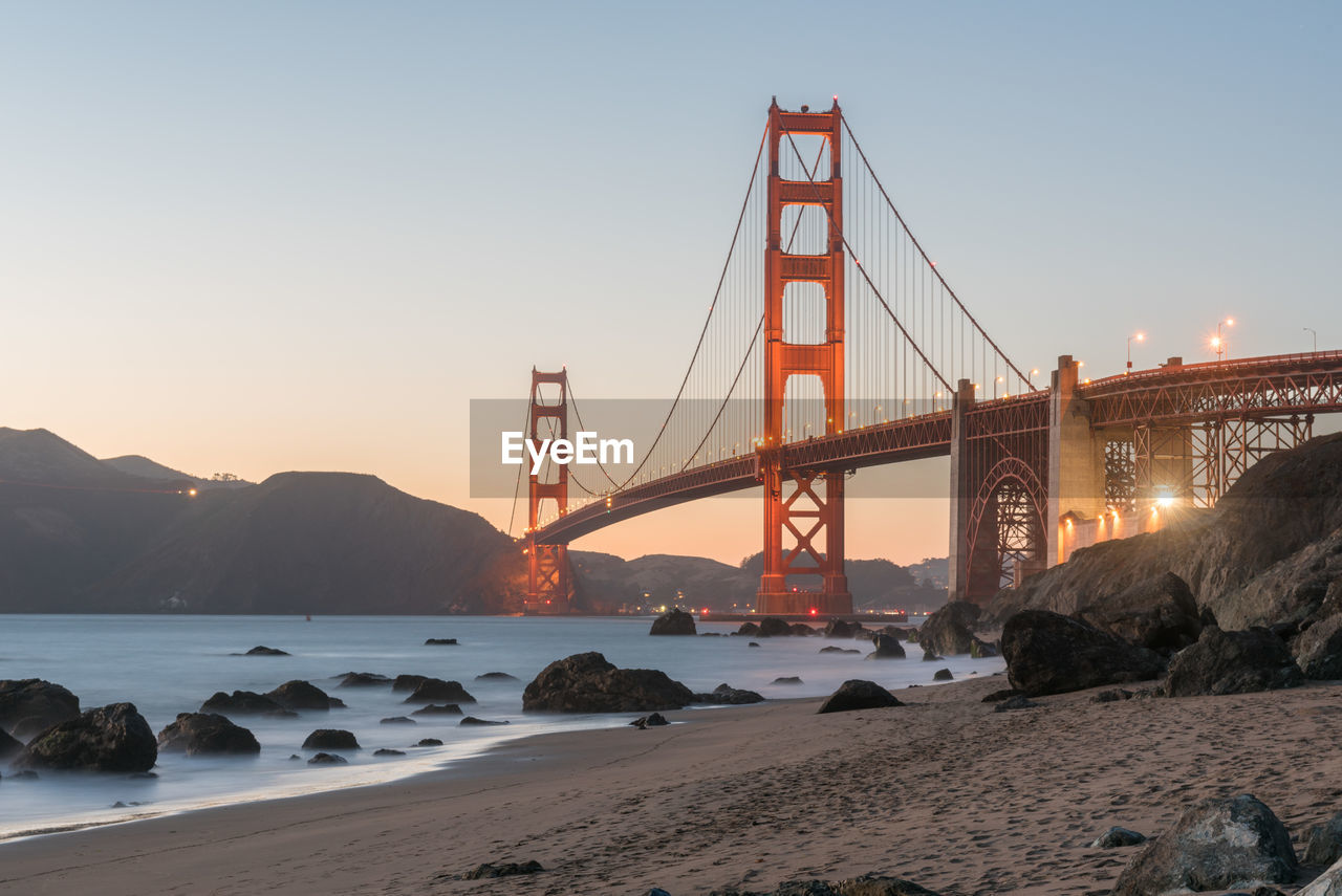 VIEW OF SUSPENSION BRIDGE AT SEASIDE