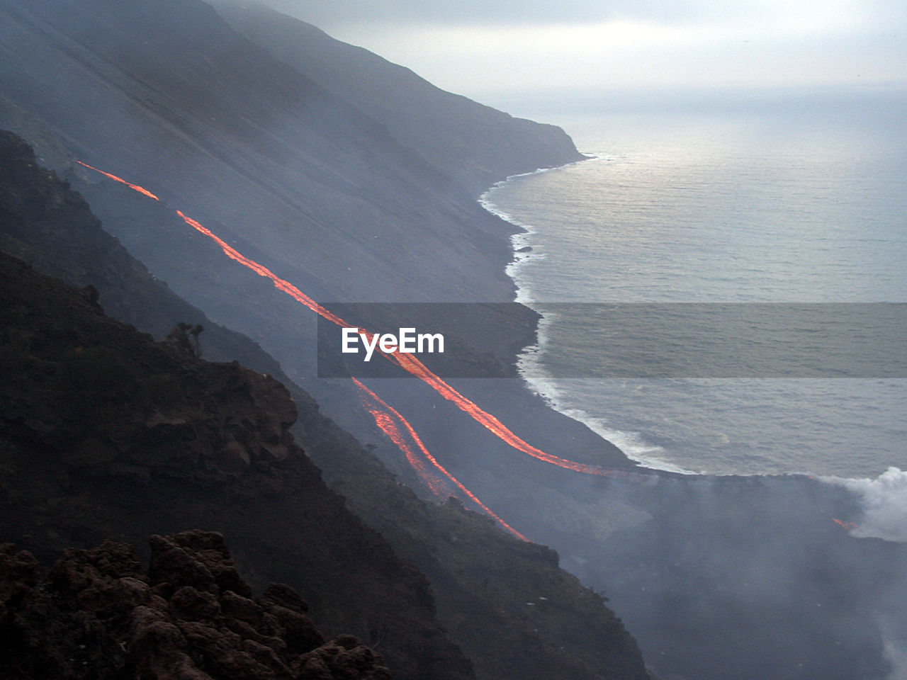 High angle view of stromboli volcano by sea