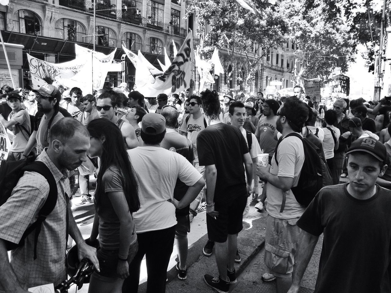 PEOPLE STANDING IN CITY