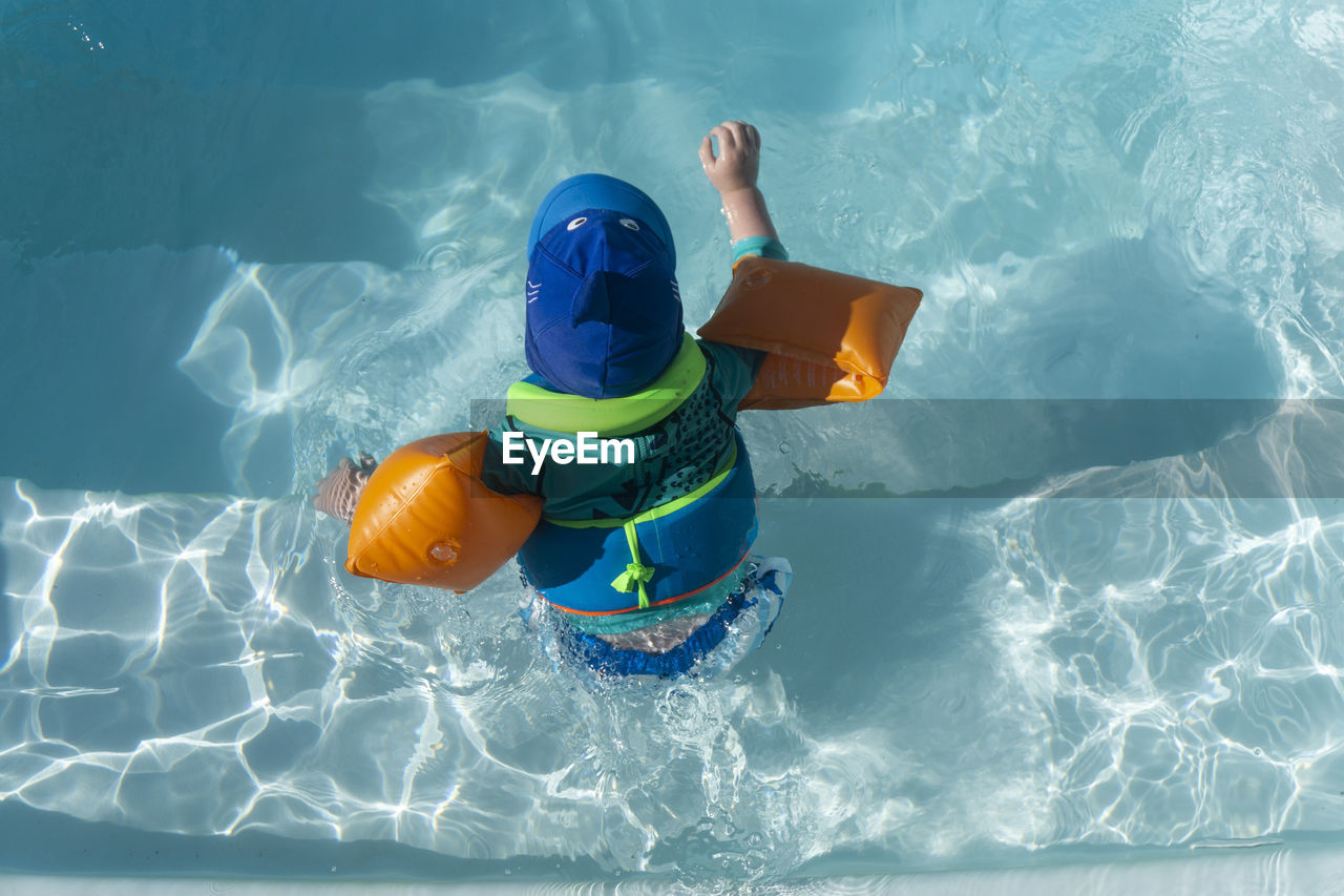 High angle view of toys in swimming pool