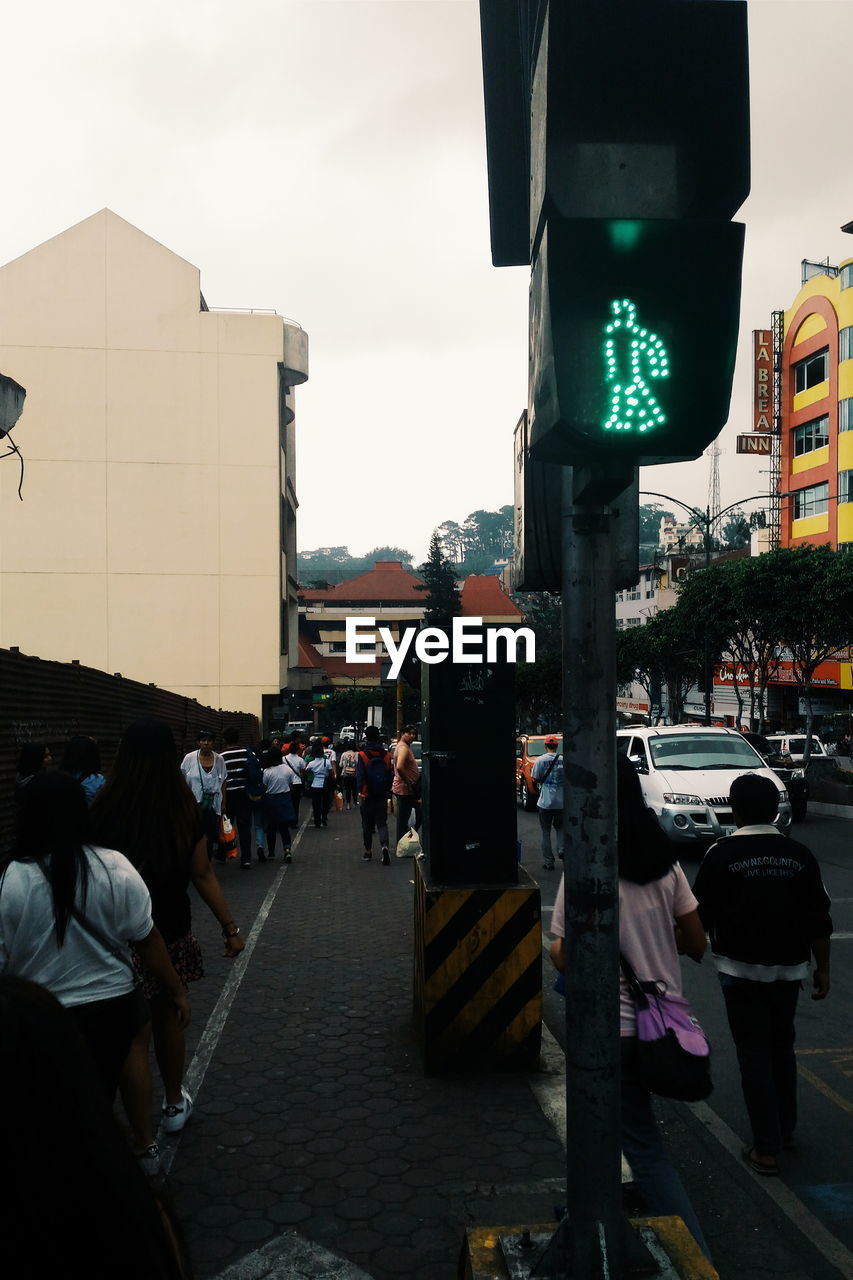 PEOPLE WALKING ON STREET